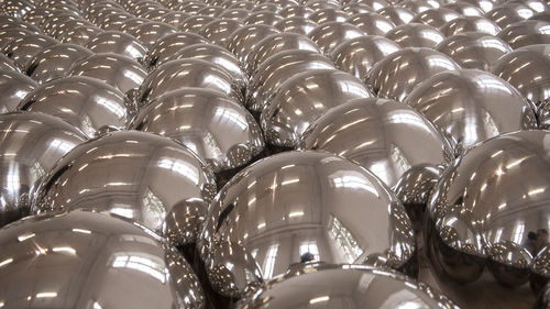 Full frame shot of row of metal balls