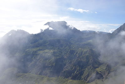 Aerial view of volcanic landscape against sky