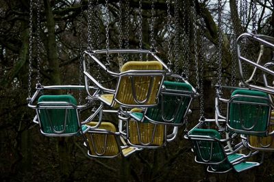 Empty chairs in forest