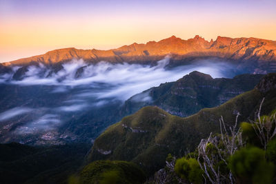 Scenic view of mountain against sky during sunset