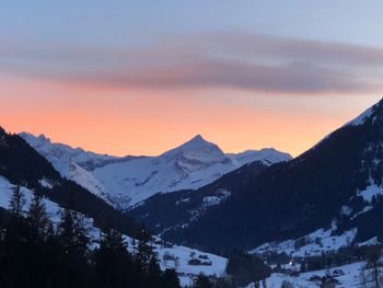 Scenic view of mountains against sky during sunset