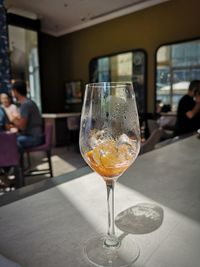 Glass of wine on table in restaurant