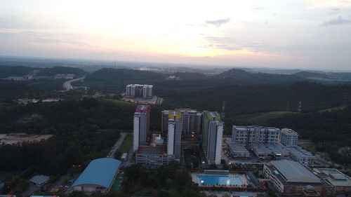 High angle view of cityscape against sky during sunset
