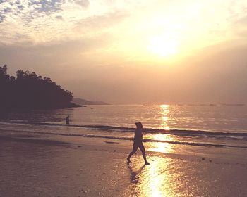 Scenic view of sea at sunset