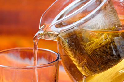 Close-up of drink in glass jar on table