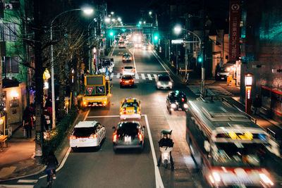 Traffic on city street at night