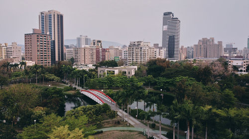 High angle view of city buildings against sky