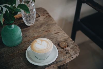 High angle view of coffee cup on table