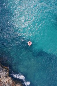 High angle view of swimming in sea