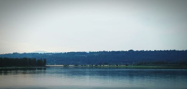 Scenic view of lake with mountains in background