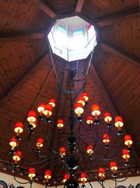 Low angle view of illuminated ceiling