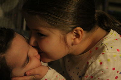 Close-up of mother and daughter