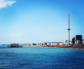 Scenic view of sea against blue sky