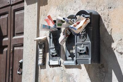 High angle view of papers in city on sunny day