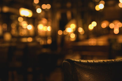 Close-up of illuminated lights on table