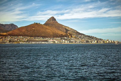 Panoramic view of cape town waterfront and harbor, table mountain and lions head hill, south africa