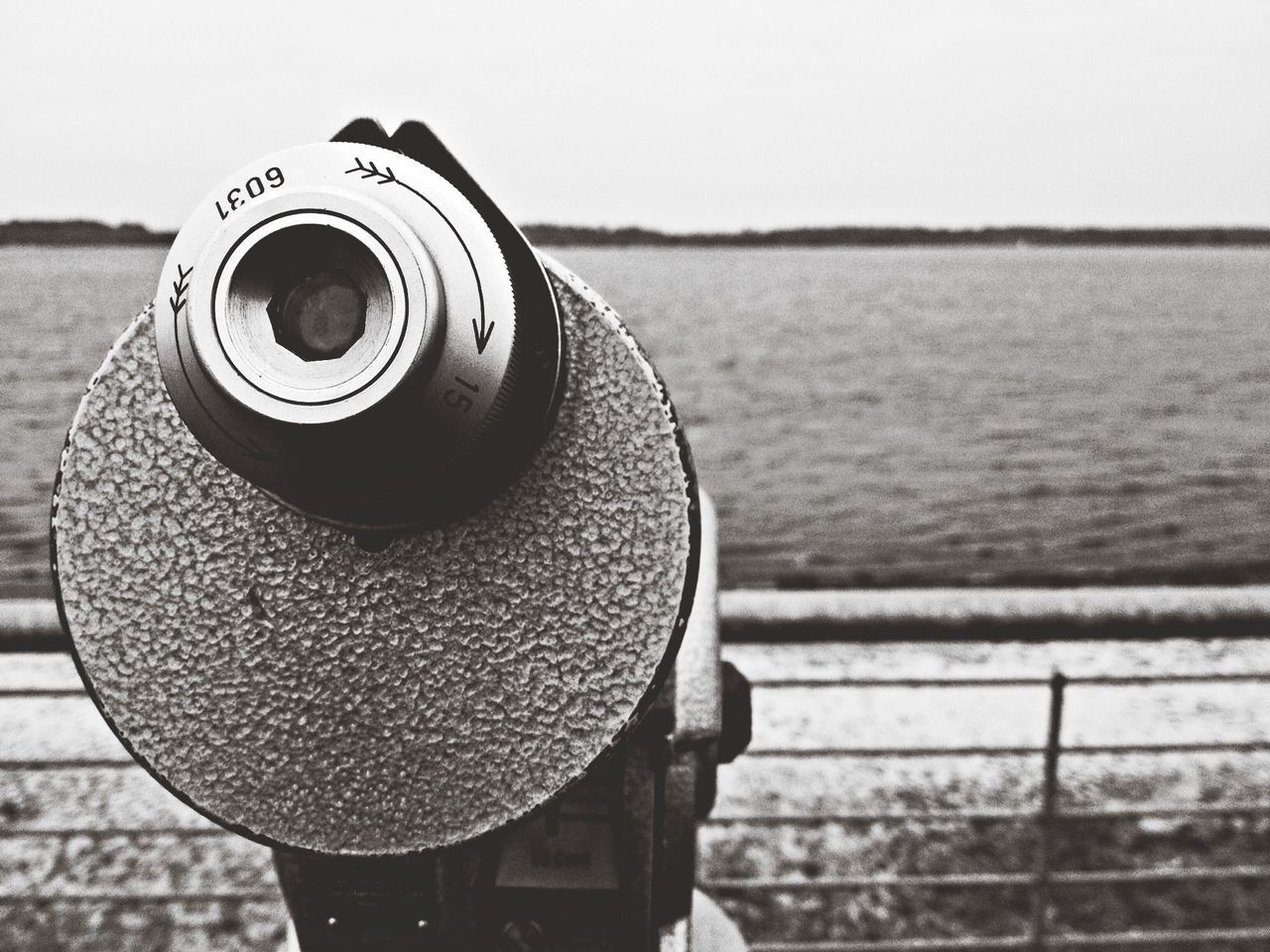 focus on foreground, close-up, metal, coin-operated binoculars, photography themes, technology, sea, water, sky, clear sky, camera - photographic equipment, coin operated, outdoors, metallic, day, no people, selective focus, transportation, copy space, nature