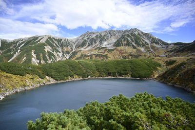 The lake is very beautiful with nature and magnificent mountains in the japanese alps.