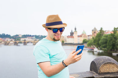 Young man using mobile phone