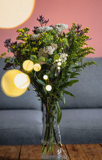 Close-up of flowering plant in vase on table