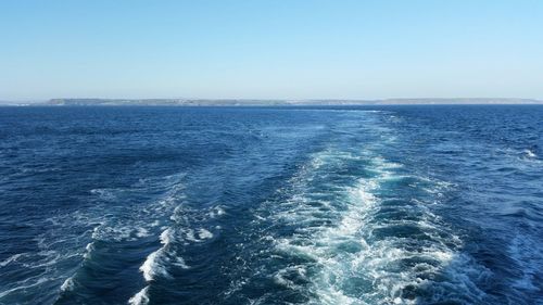 Scenic view of sea against clear sky