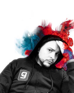 Portrait of young man against white background