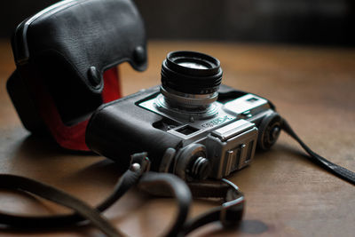 Close-up of camera on table