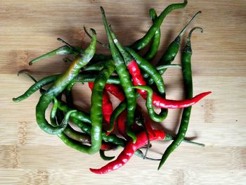 High angle view of chili peppers on table