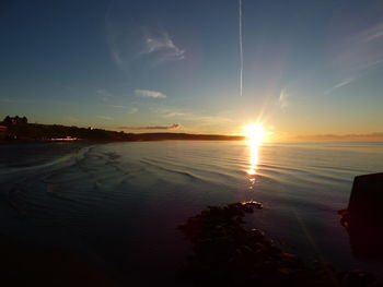 Scenic view of sea at sunset