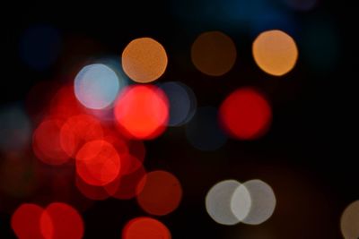 Defocused image of illuminated lights at night