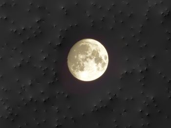 Low angle view of moon against sky