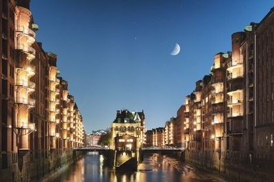 View of illuminated buildings at night