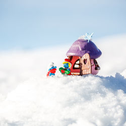 Low angle view of snow against sky