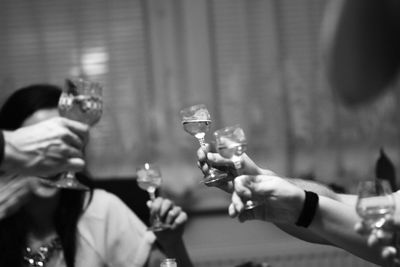 Close-up of hand holding wine glass