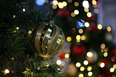 Close-up of illuminated christmas tree at night