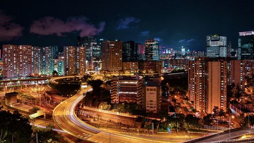 High angle view of illuminated city buildings at night