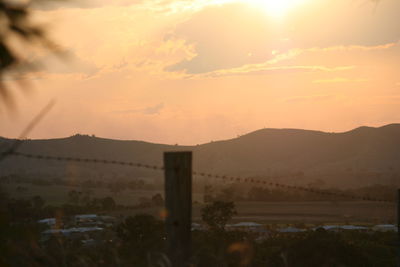 Scenic view of mountains at sunset