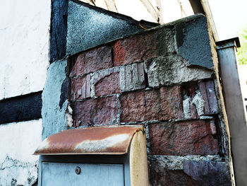 Low angle view of weathered wall