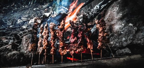 Close-up of bonfire on barbecue grill