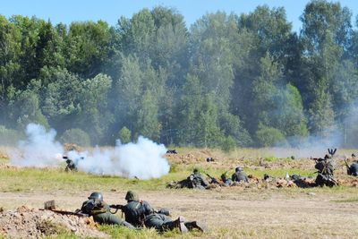 Historical reenactment of war on field