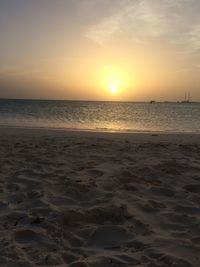 Scenic view of sea at sunset