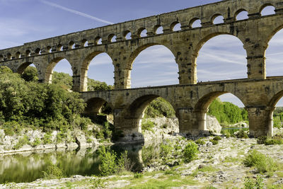 Arch bridge over river