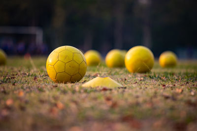 Close-up of yellow ball on field