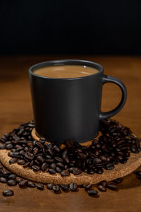 Close-up of coffee cup on table