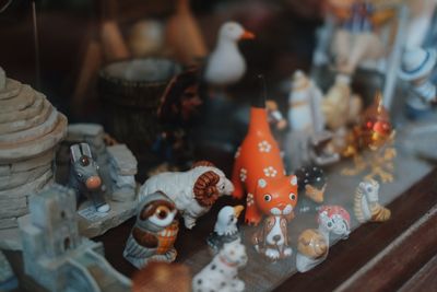 Close-up of figurines at retail display