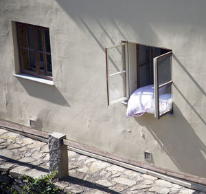 High angle view of pillows on window