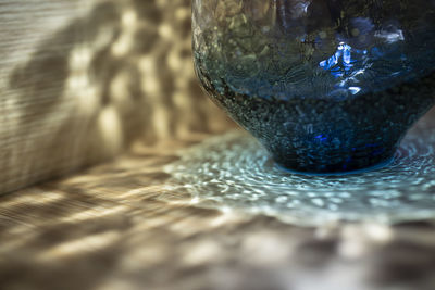 Close-up of glass on table