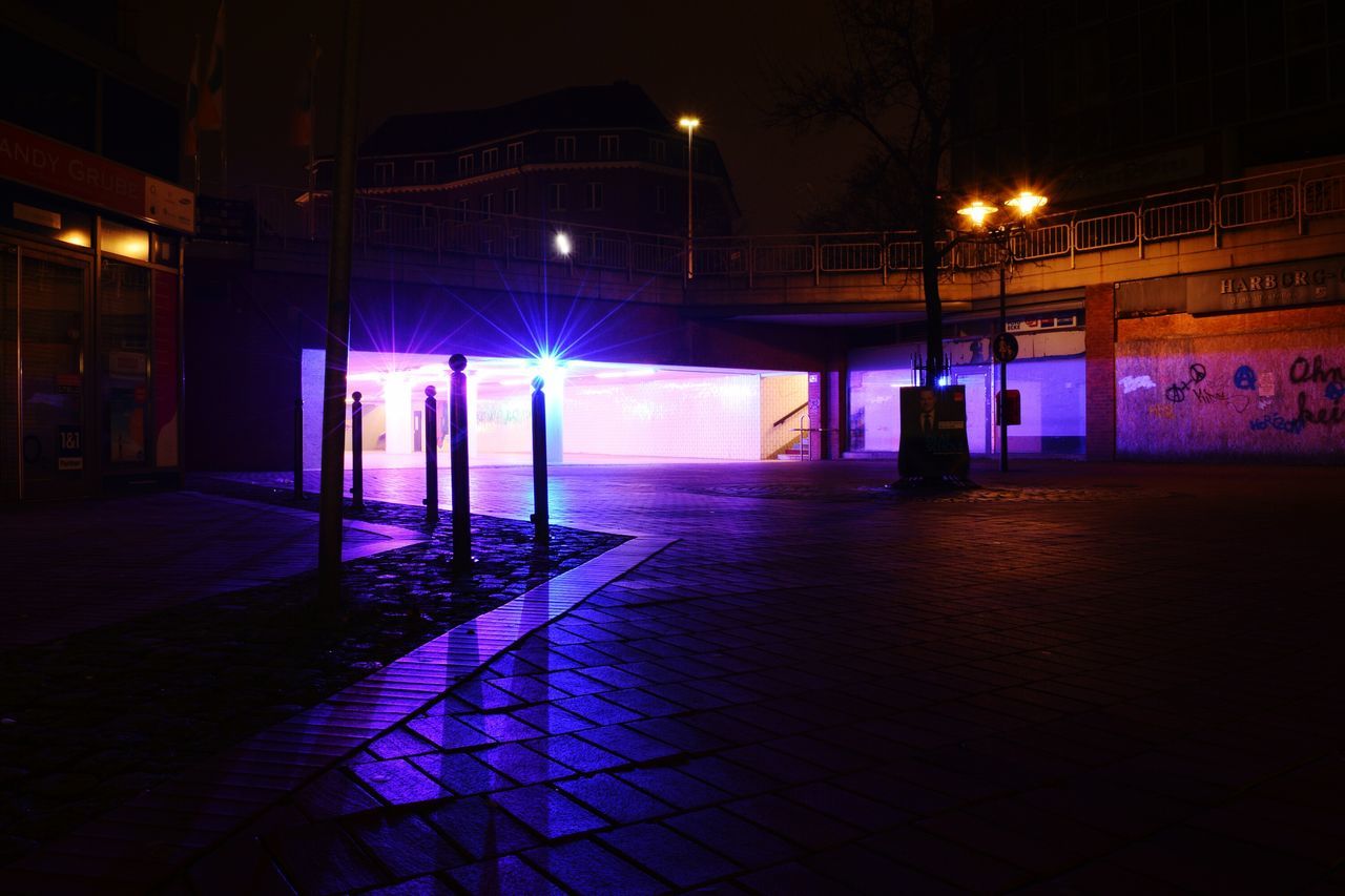 night, illuminated, built structure, architecture, building exterior, lighting equipment, street light, light - natural phenomenon, street, city, cobblestone, sidewalk, glowing, dark, the way forward, outdoors, empty, footpath, long exposure, walkway