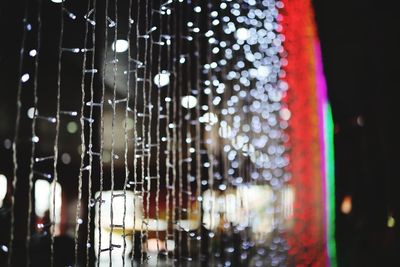 Close-up of wet glass window in rainy season