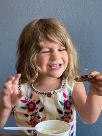 Portrait of smiling girl holding ice cream